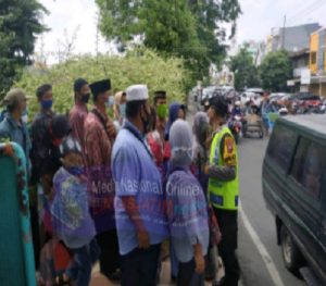 Polsek Semampir Sampaikan Himbauan Protokol Kesehatan Kepada Pengunjung Wisata Ampel