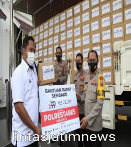 Bantu 1000 paket Sembako lagi Juragan 99 melalui Polrestabes Surabaya Untuk Masyarakat Terdampak Pandemi