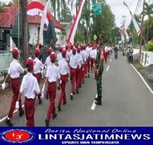 Babinsa Koramil 0801/01 Pacitan Laksanakan Pengamanan Lomba Gerak Jalan