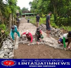 Koramil Gerih Bersama Warga Masyarakat Laksanakan Kerja bakti Pavingisasi