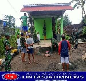 Satgas TMMD Bersama Warga Selesaikan Pengecatan Pos Kamling