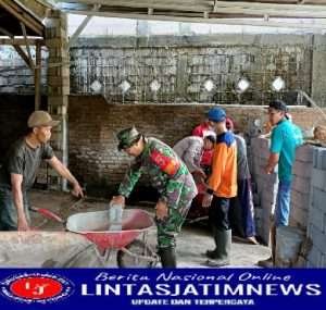 Sinergitas TNI – Polri dan Masyarakat, Polres Batu Bedah Rumah Warga yang Tak Layak Huni