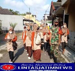 Babinsa Bersama Kader Jumantik Laksanakan PSN