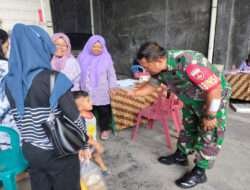 Babinsa kemlayan Dampingi Puskesmas & PKK Bantu Posyandu