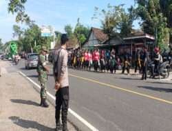 Anggota Koramil Padas melaksanakan Pengamanan Kegiatan Paguyuban Pencak Silat