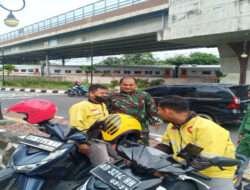 Perbanyak Mitra Karib Babinsa Sondakan Komsos Dengan Driver Ojek Online