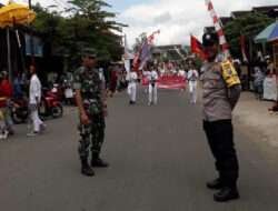Kolaborasi Gemilang Koramil 0806/09 Tugu dan Polsek Tugu dalam Pengamanan Pawai Budaya Trenggalek