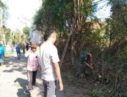 Koramil Bantaran Bersama Masyarakat Kerja Bakti Bersihkan Jalan Desa