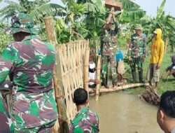 Upaya Anggota Koramil 0812/12 Modo Dalam Penanggulangan Tanggul Jebol