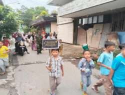 Babinsa dan Bhabinkamtibmas Amankan Jalan Sehat TPA