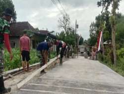 Satgas TMMD Fokus Finishing Merapikan Kanan Miri Jalan Beton