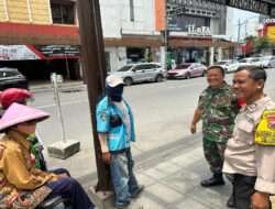 Pengelola Parkir dan Tukang Becak di Pasar Modern Matahari Singosaren Didatangi Babinsa, Ada Apa..??