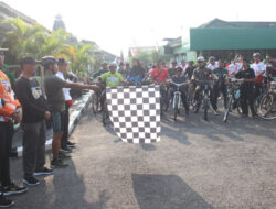 Sambut HUT TNI Ke-79, Kodim Ngawi Gelar Fun Bike dan Senam Bersama