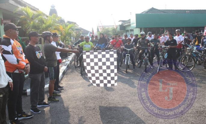 Sambut HUT TNI Ke-79, Kodim Ngawi Gelar Fun Bike dan Senam Bersama