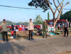 Babinsa Koramil Padas dan Polsek Padas Kompak Pengamanan Senam Perwosi