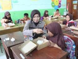 Polres Probolinggo Berbagi Makanan Bergizi Untuk Pelajar Sekolah Dasar