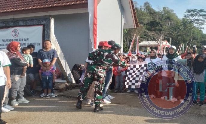 Babinsa 0801/10 Punung Kawal Kegiatan Jalan Sehat Memeriahkan HUT RI Ke 80