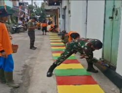 Guyub Rukun, Satgas KBD Ke-5 TA. 2025 Kodim 0735/Surakarta akhiri dengan Pengecatan Lis Jalan dan Penutup Saluran Air