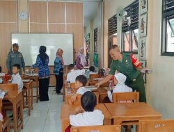 Serka Sudiyono Bantu Pendistribusian Program Pemerintah Makanan Bergizi Gratis (MBG) di SDN 59 Joyotakan