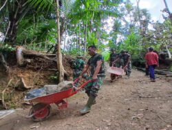 Satgas TMMD dan Warga Wonorejo Semangat Kerjakan Rabat Jalan