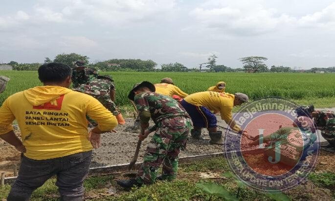 Kolaborasi Pasukan Kuning dengan Pasukan Loreng di TMMD Reg Ke-128 Kodim 0725/Sragen
