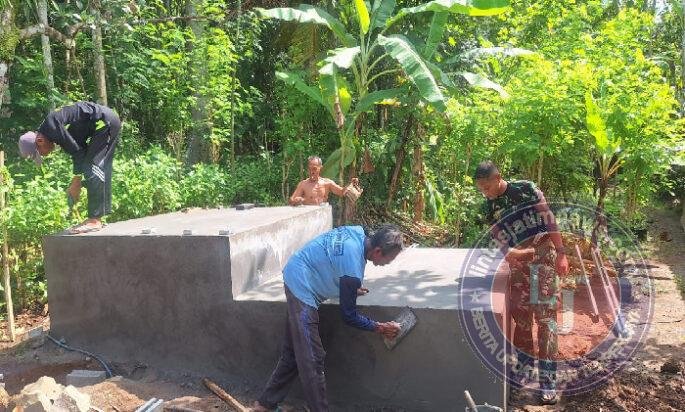 Satgas TMMD Bangun Tempat Penampungan Air Sumur Bor
