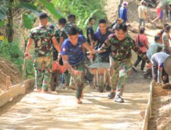 Semangat Satgas TMMD Menyelesaikan Rabat Jalan