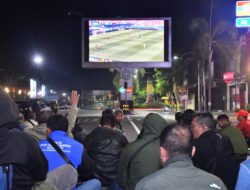 Satu Layar, Seribu Semangat: Kodim Madiun Gelar Nobar Piala Dunia Bersama Masyarakat