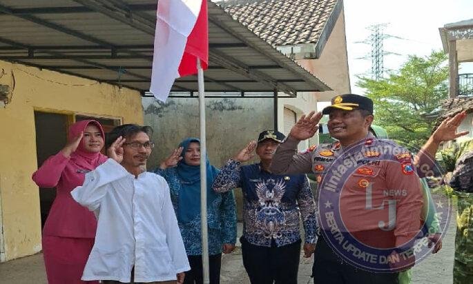 Polsek Bangil Kerahkan Personel Bersama Tiga Pilar Bangkitkan Nasionalisme Lewat Gerakan Bendera Merah Putih