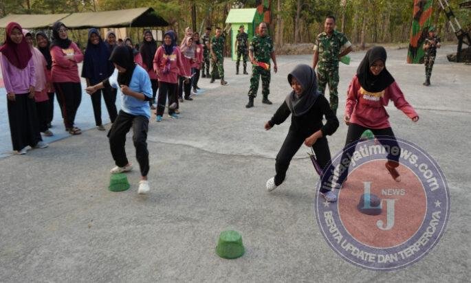 Prajuti Yonif TP 449/SH Larut Dalam Kecerian Lomba 17-an Bersama Warga