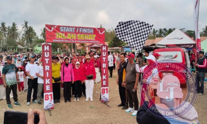 Perkuat Persatuan dan Kesatuan, Danramil 0801/12 Pringkuku Ikuti Jalan Sehat Meriahkan HUT RI Ke 81