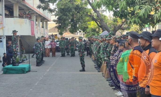 Sambut HUT ke-81 RI & HUT Ke-76 Kodam IV/Diponegoro, Kodim 0735/Surakarta Gelar Karya Bakti Bersih Sampah di Pasar Nusukan