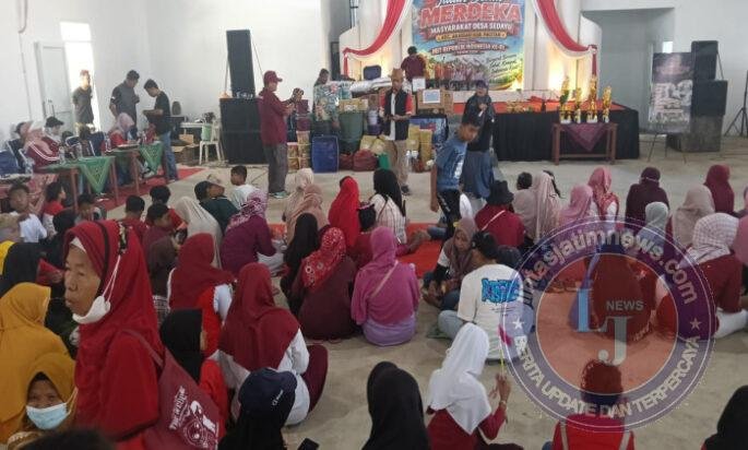 Meriahkan HUT RI Ke 81, Babinsa Serda Taufik Berikan Pengamanan Jalan Sehat di Tingkat Desa